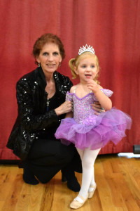 A woman and child pose for the camera.